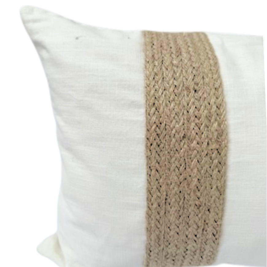 White cushion with a woven jute band.