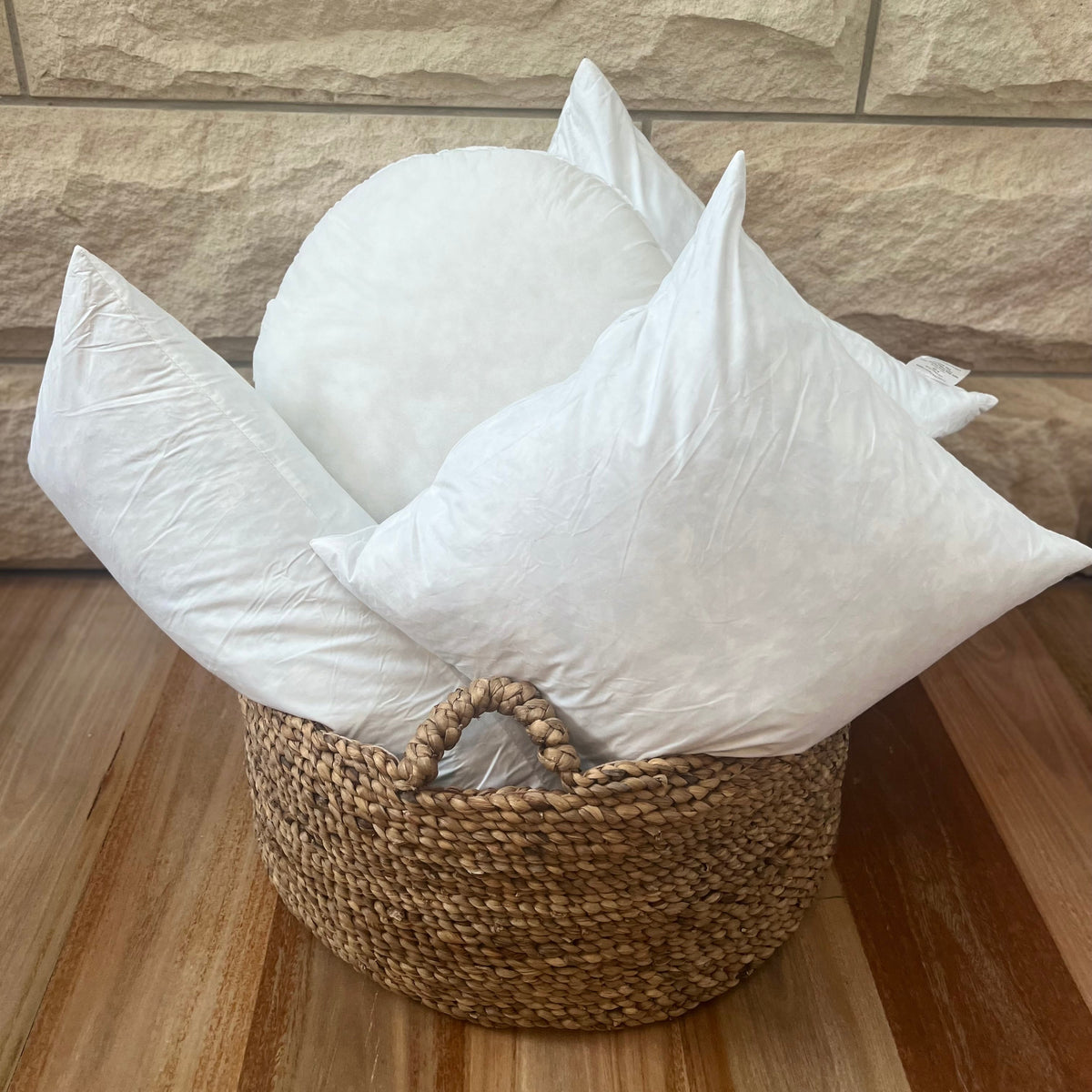Pillows on a basket.