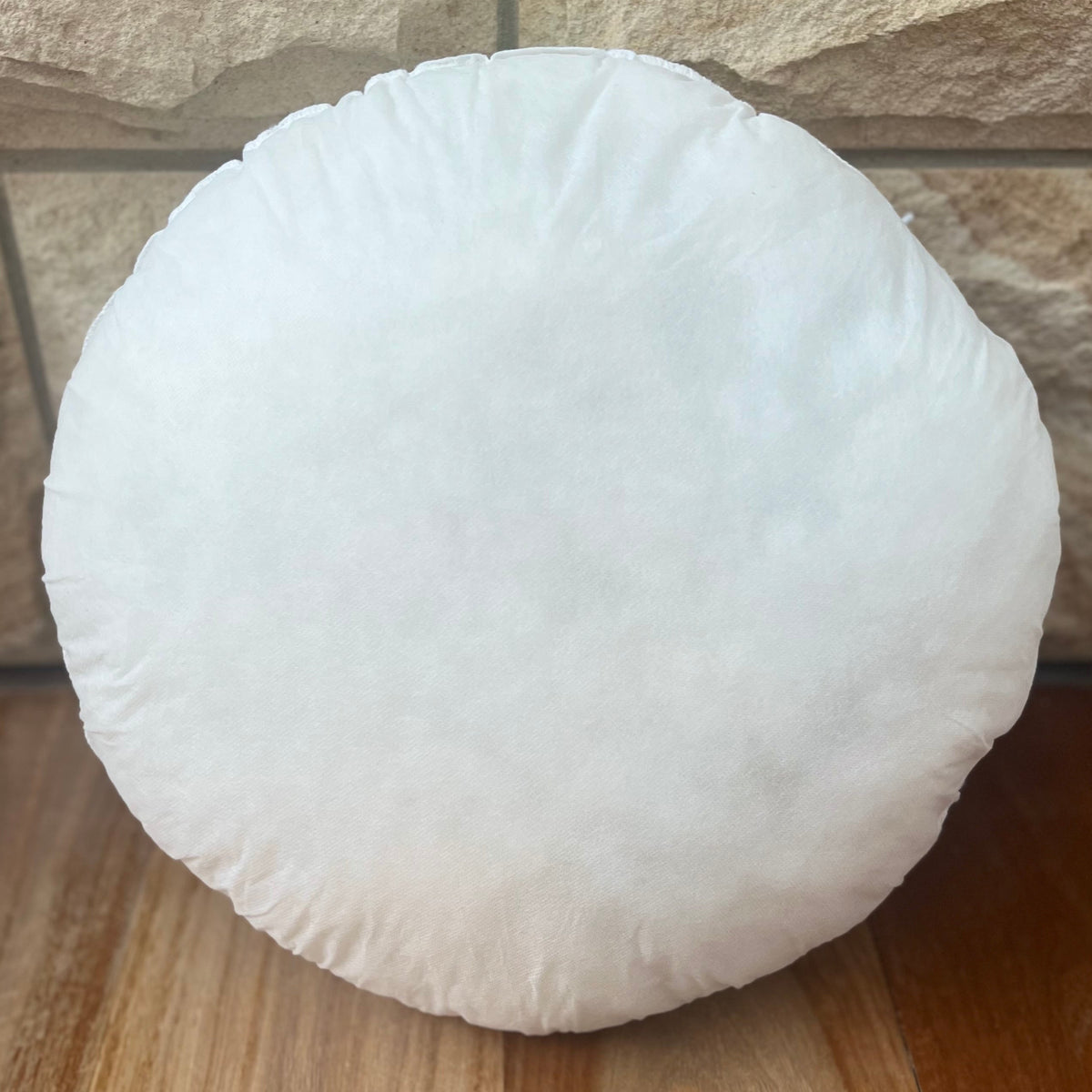 White cushion at the floor.