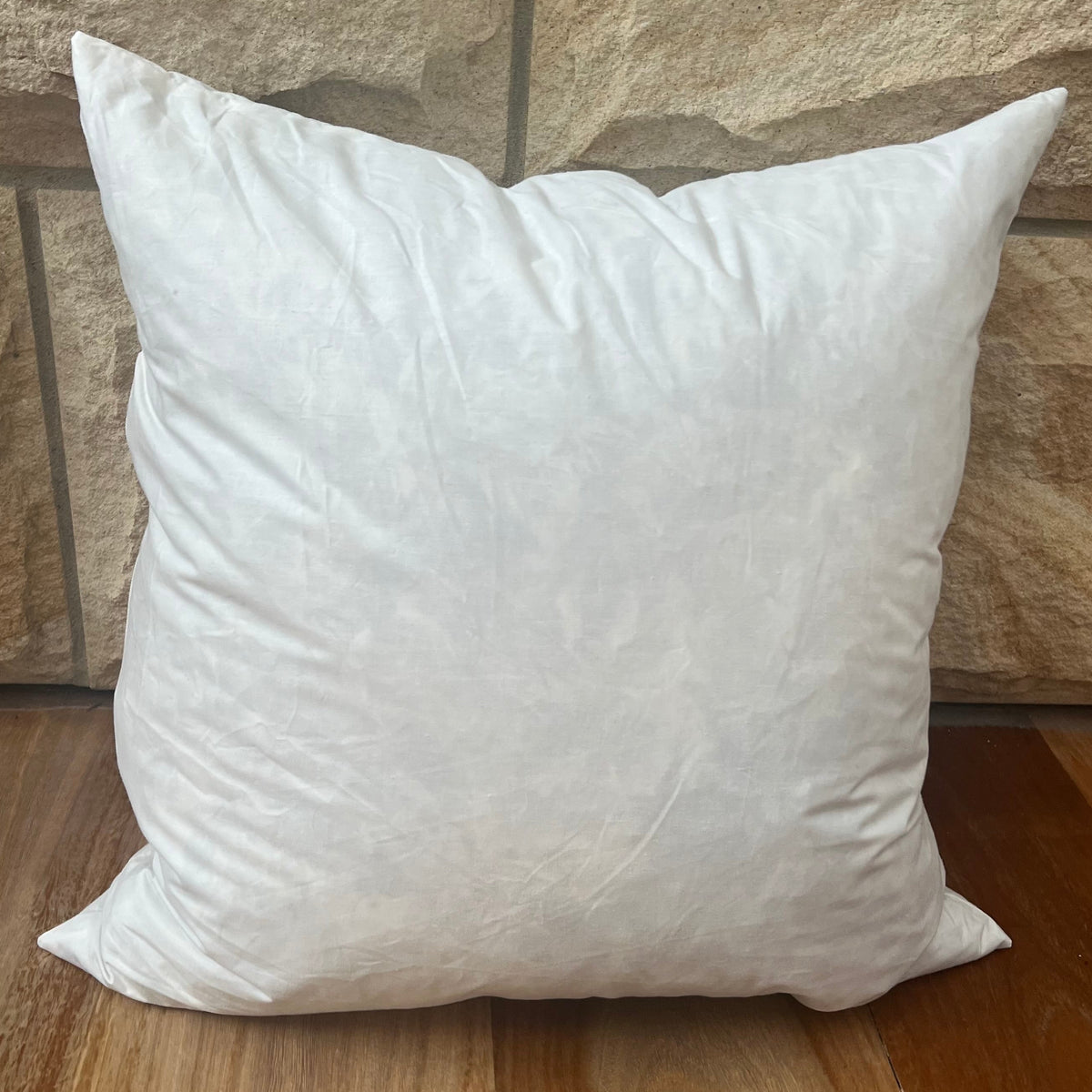 Square white cushion.