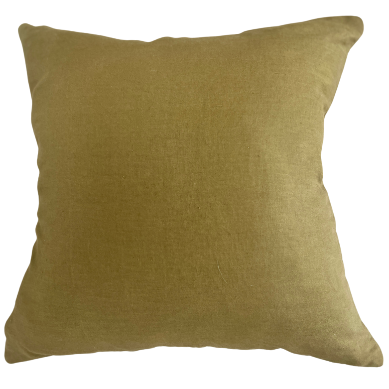 A square-shaped luxury linen throw cushion in an olive green color with a subtle texture, featuring an invisible zipper.