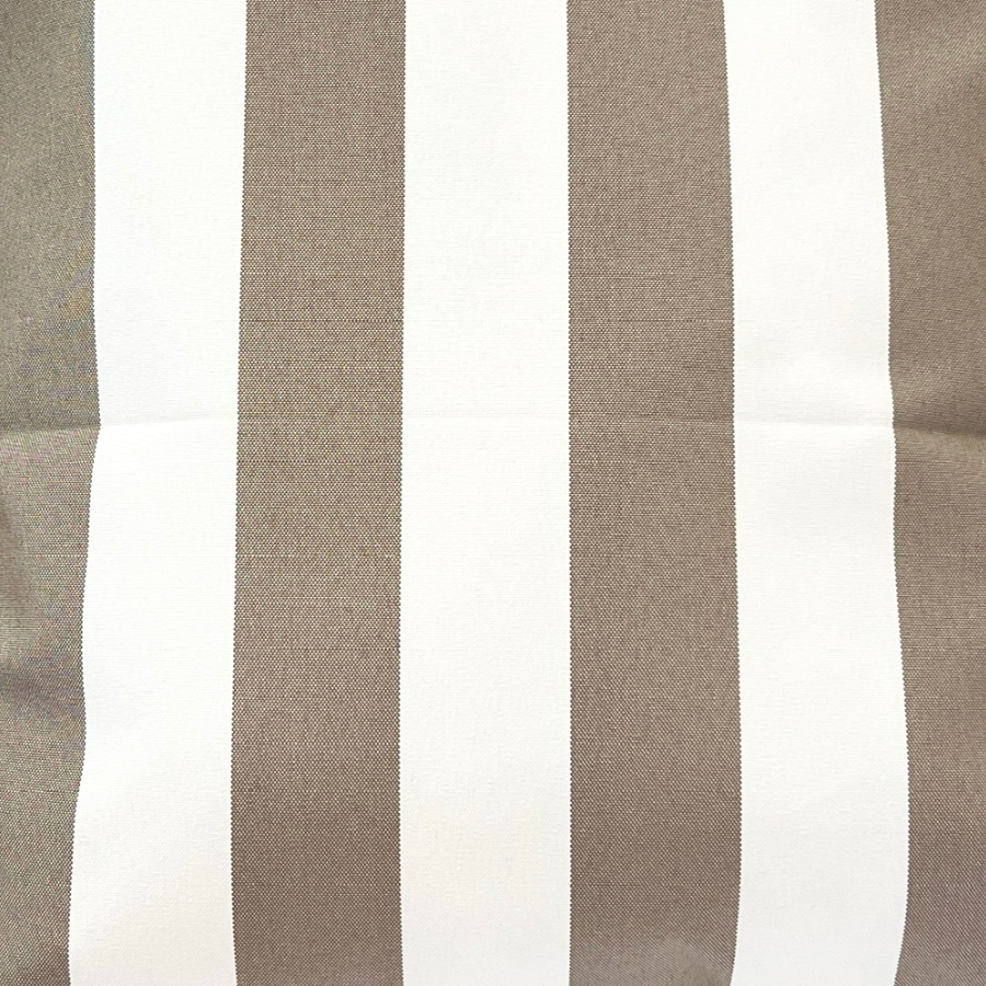 A large floating pool cushion with orange and white vertical stripes.
