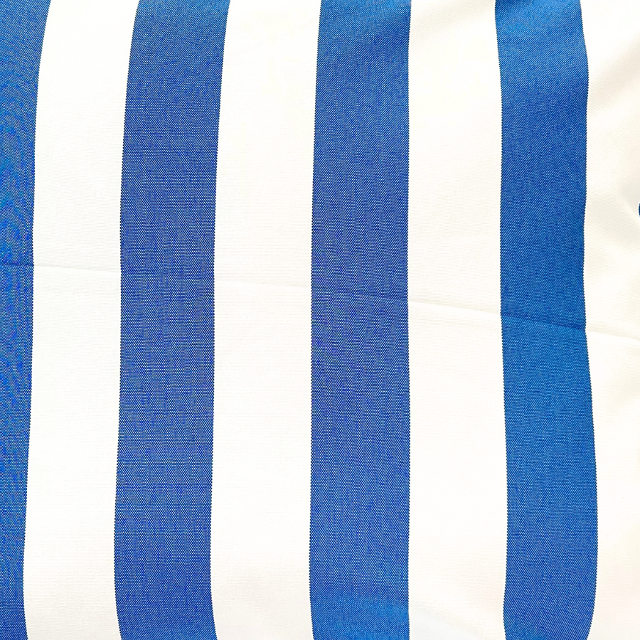 Close-up of a fabric with blue and white vertical stripes.