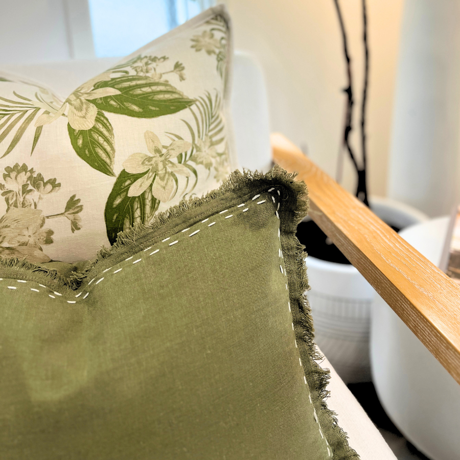 Green and natural floral linen cushion and Sage linen with white stiching