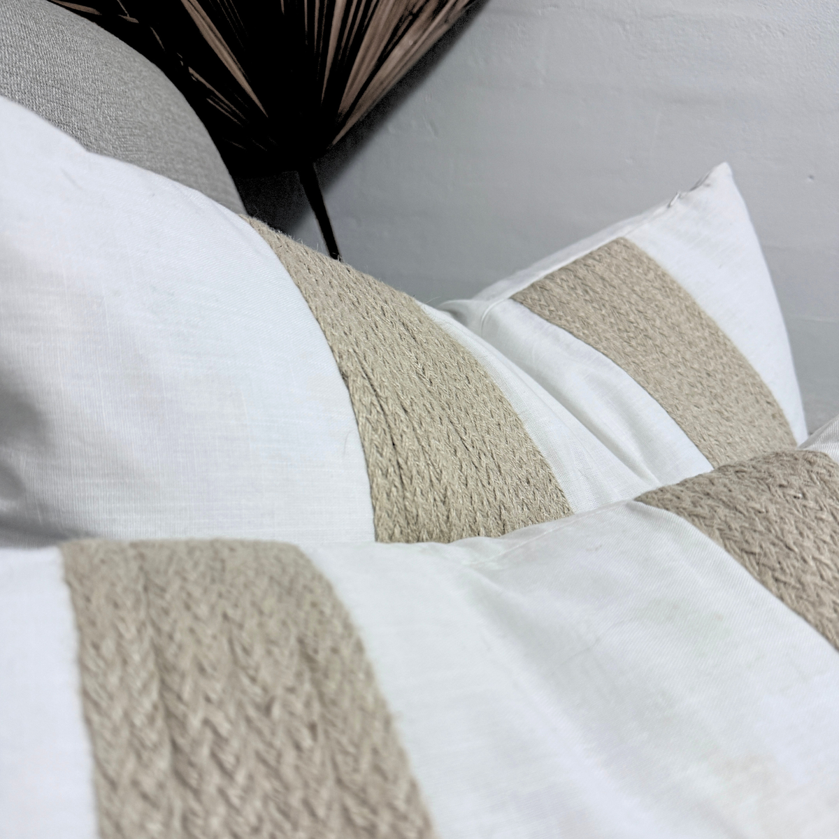Close-up of textured cushion with geometric pattern.