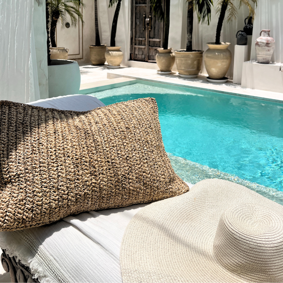 Woven cushion on a pool.