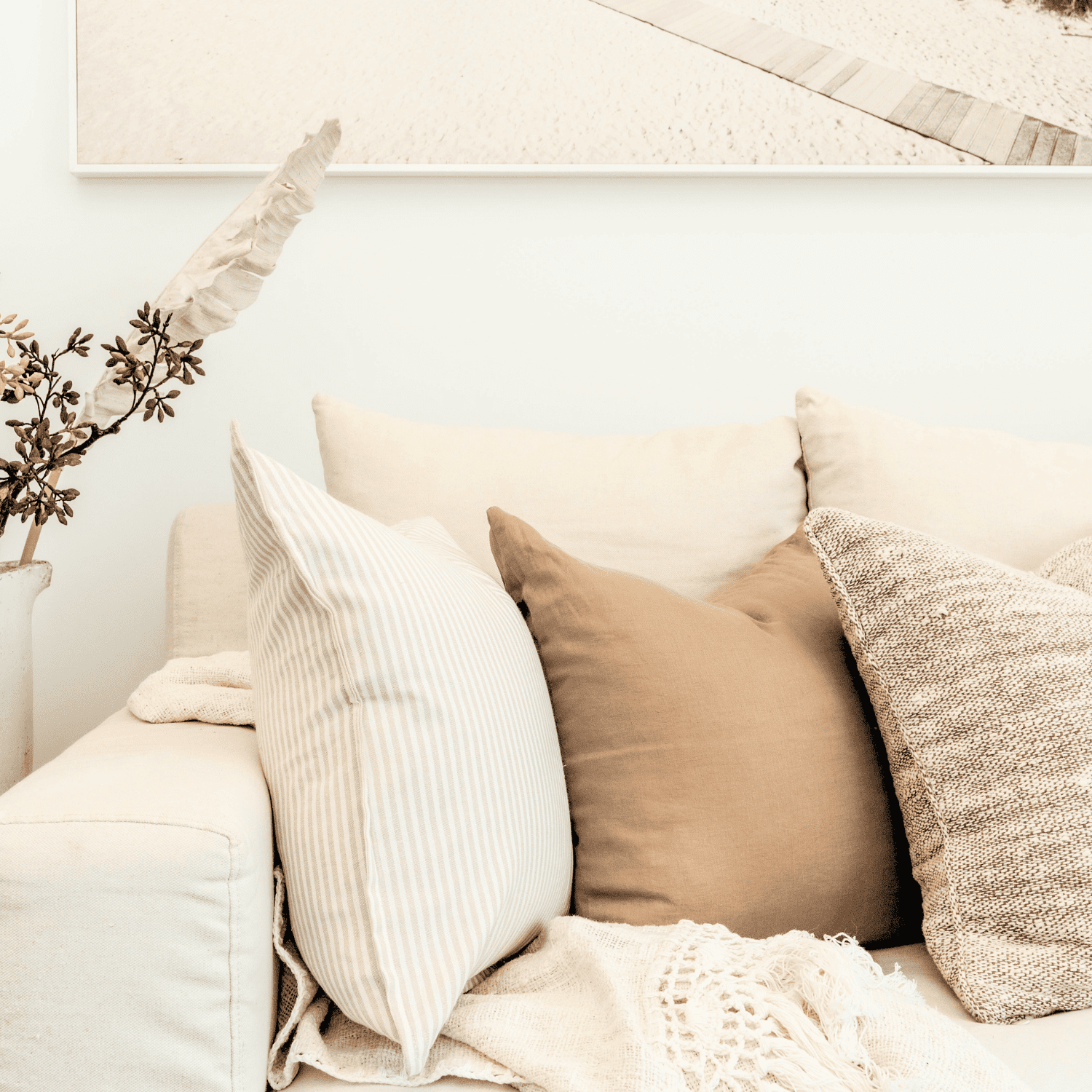 Styled cushions on a sofa