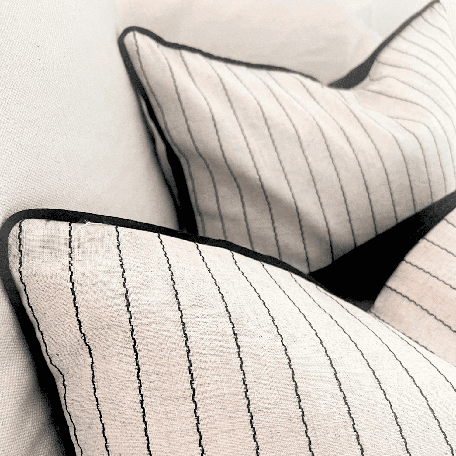 two black and white striped cushions