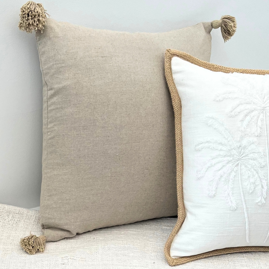 Two cushions on a sofa.