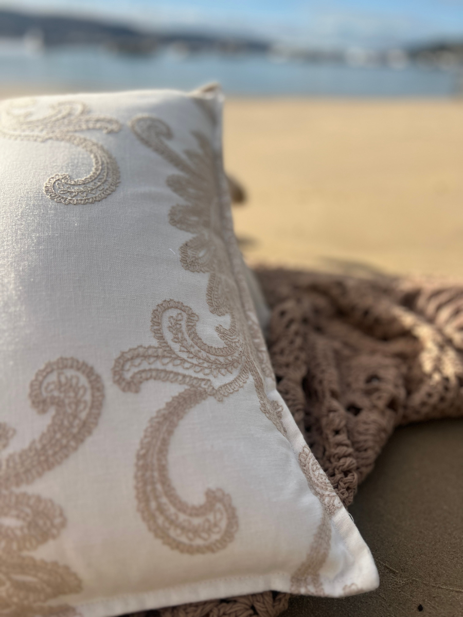 Swish embroidered cushion