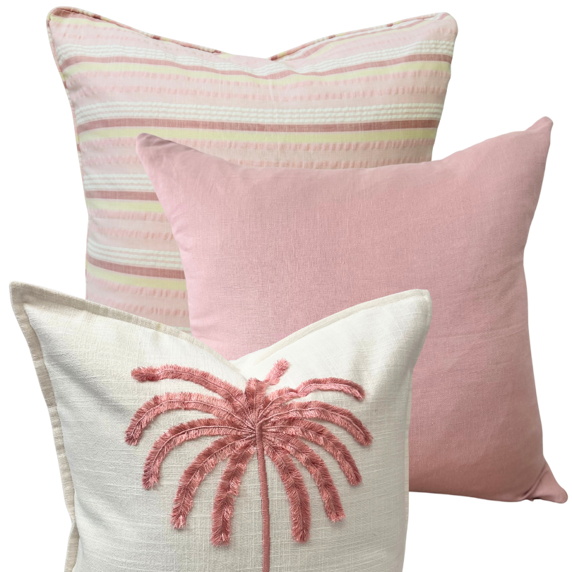 Three decorative cushion with different patterns.