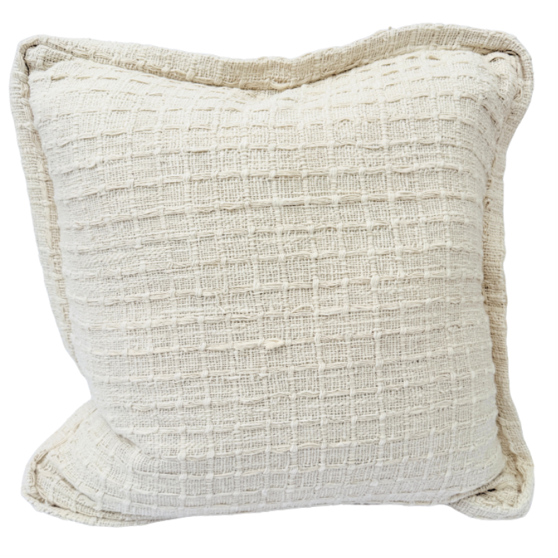 Textured beige cushion.