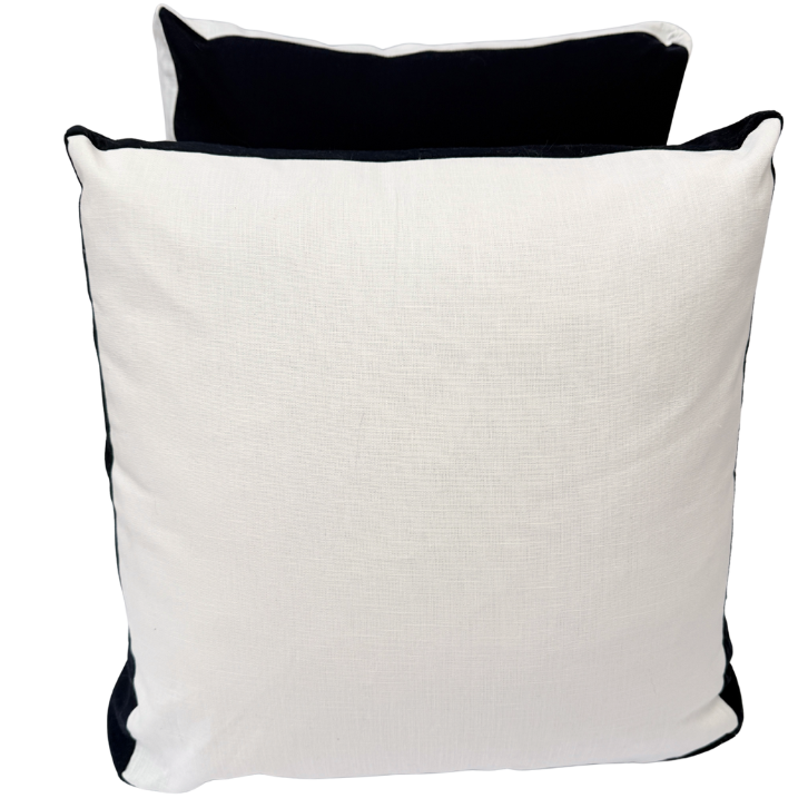 Two cushions, one black and one white.