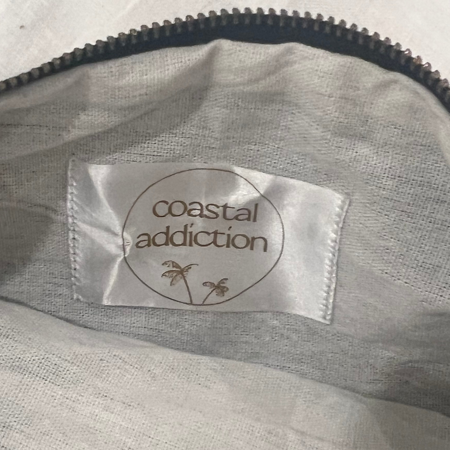 Coastal pouch accessory inside linen label detail