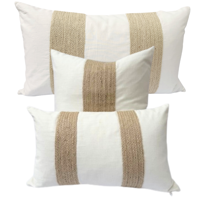 Two decorative cushion with white and brown striped patterns.