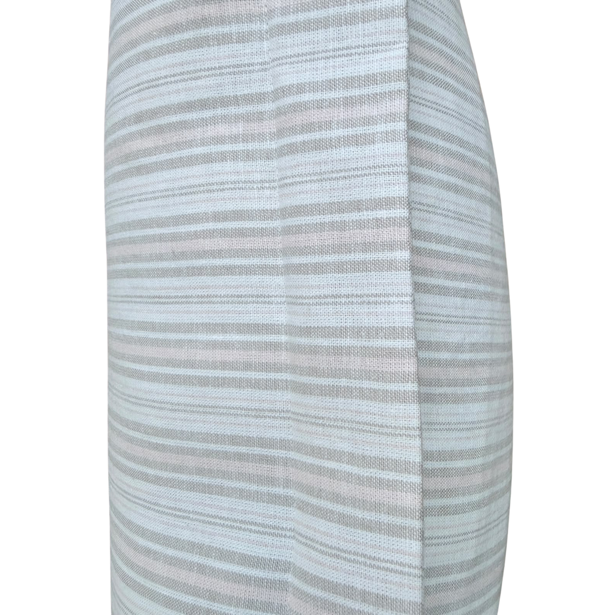 Side profile view showing the stitched border and woven fabric texture of a linen pillow.