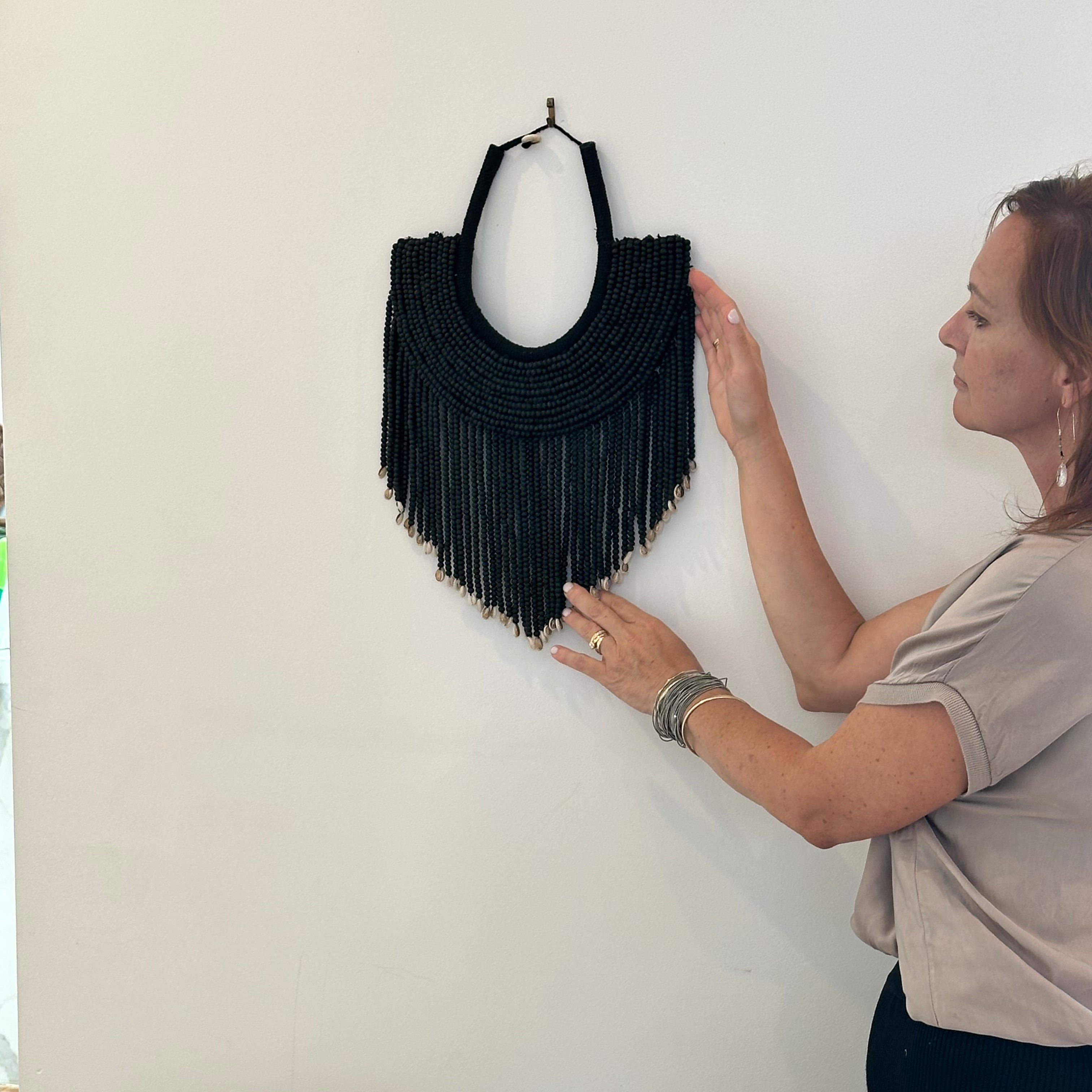 Black wall piece.