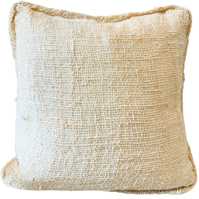 Textured beige cushion.