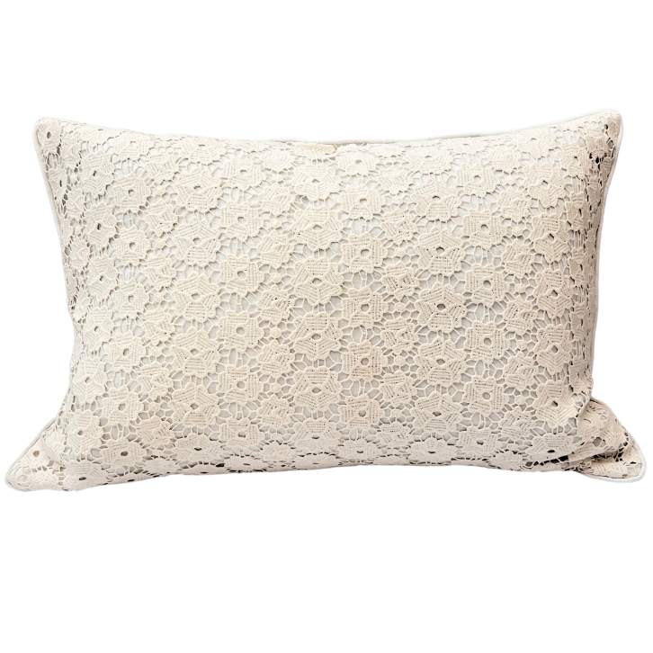 A beige floral patterned cushion cover with a subtle design, zipper visible on the side.