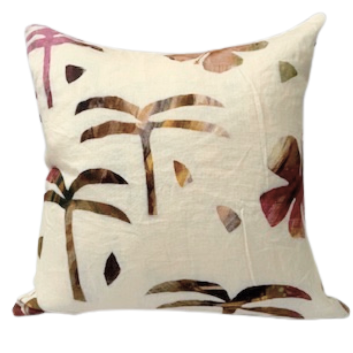Decorative cushion with floral pattern.