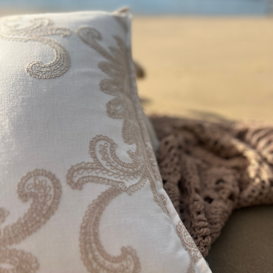 Woven art on a cushion. 