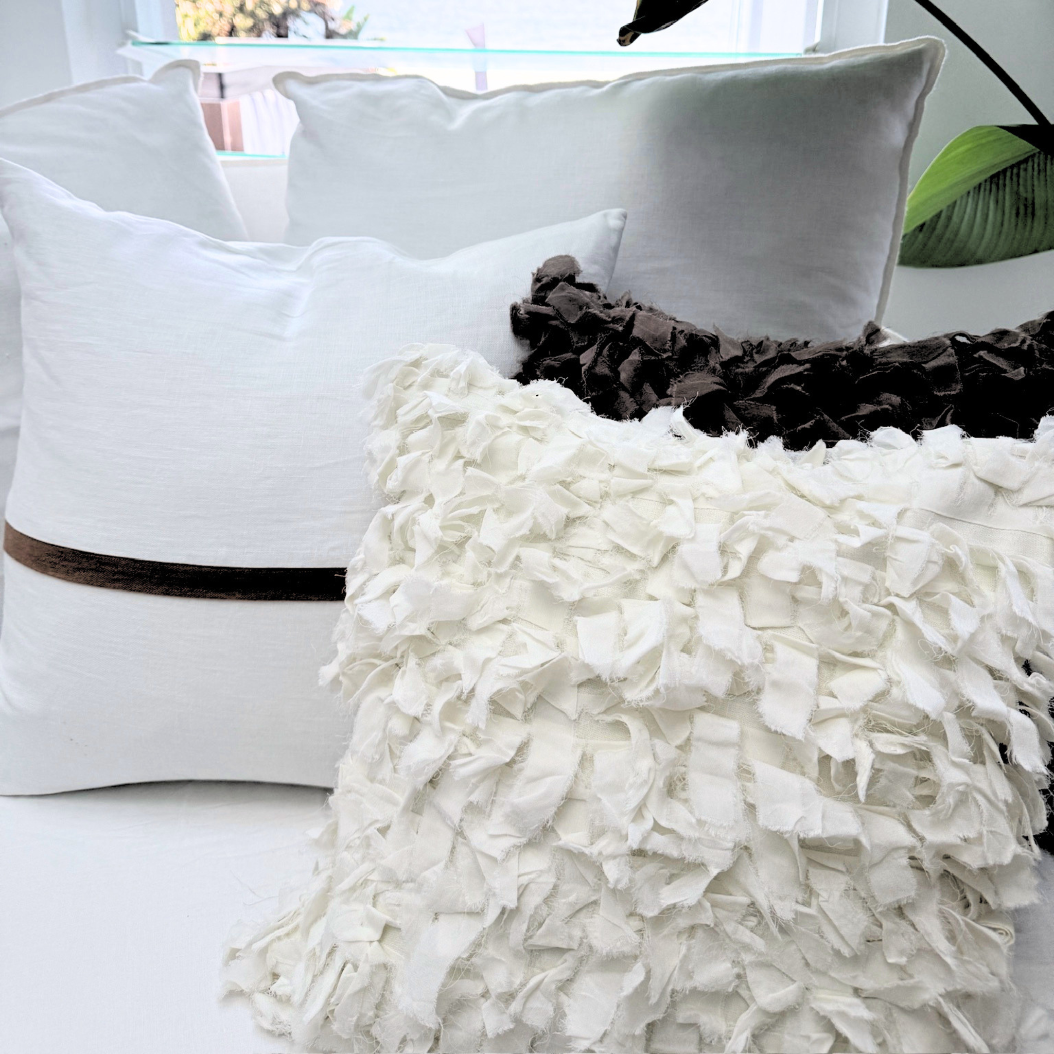 Close-up of decorative cushion with a focus on texture and color contrast.