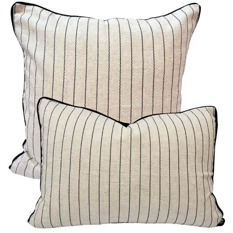 Two square throw cushion with a fine cotton stripe pattern in black and white colors, featuring piped edges and a hidden zipper.