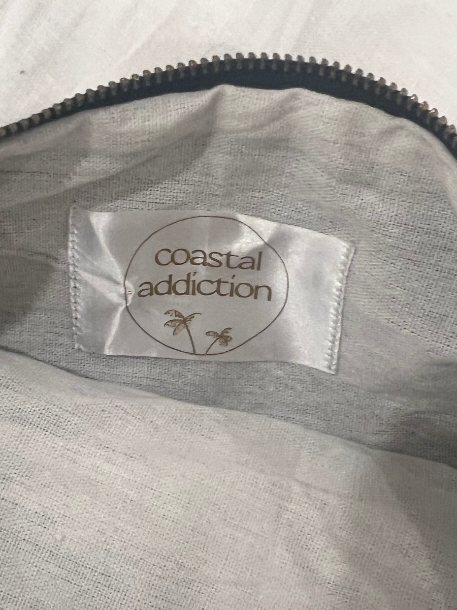 Coastal pouch accessory inside linen label detail