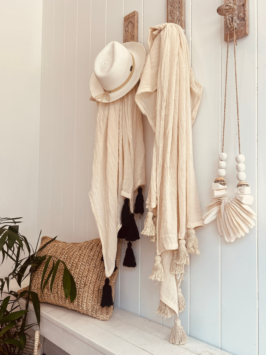 Muslin Throws in black and natural with raffia cushion