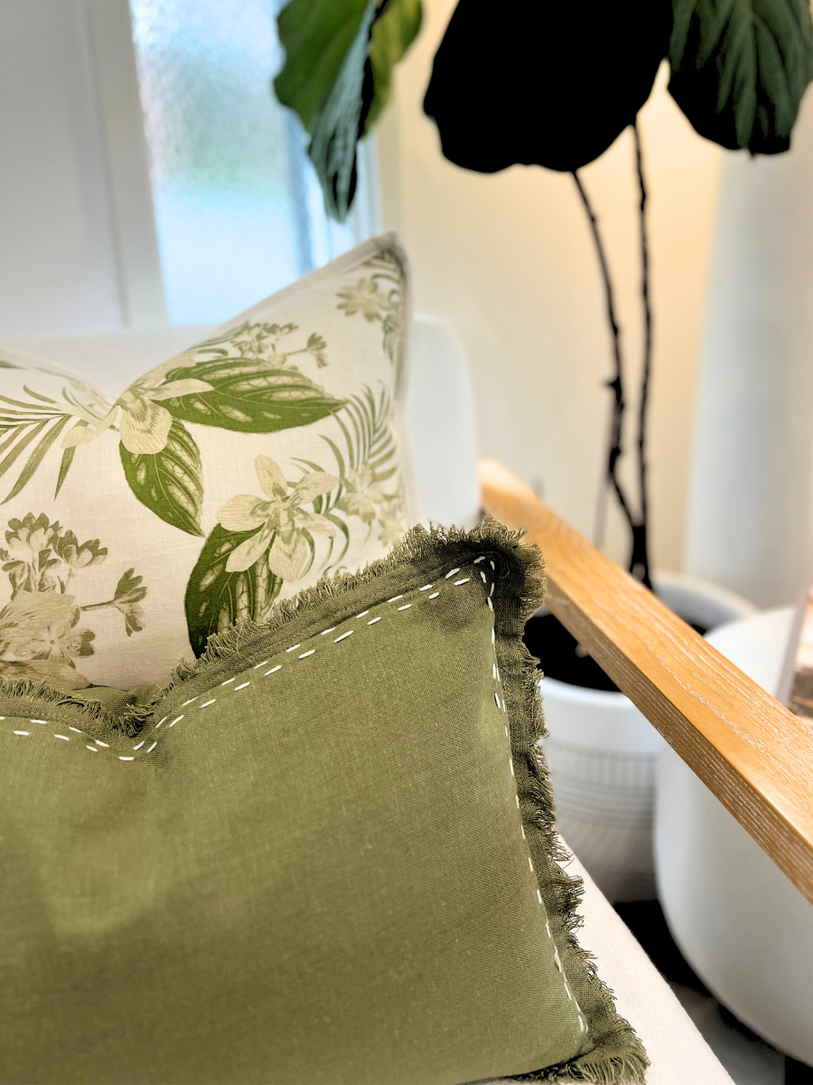 Green and natural floral linen cushion and Sage linen with white stiching